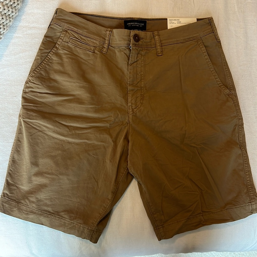 American Eagle next level flex shorts. Never worn with tags. Size 33